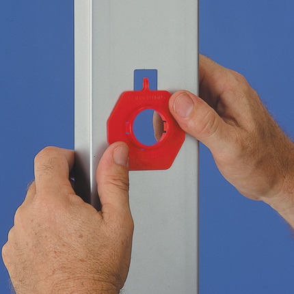 Non-metallic bushing snaps into standard knockout and fixes into common hole configurations for 2 x 4 metal studs, sold in a quantity of 100.